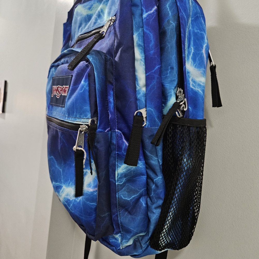 JanSport Blue Backpack with Dynamic Pattern - Picture 4 of 8